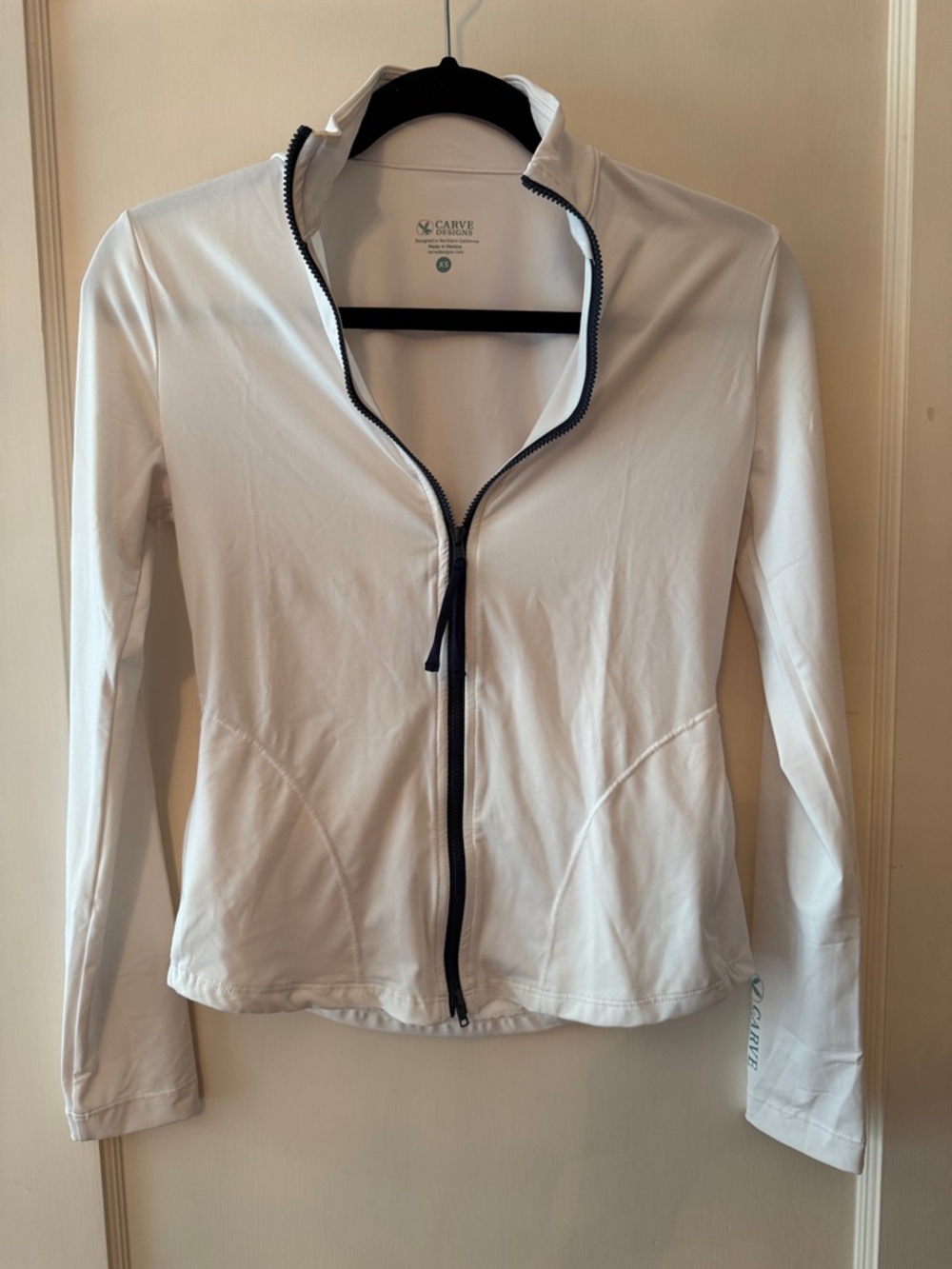 Carve Designs White Rash Guard with Navy Trim and zip pockets